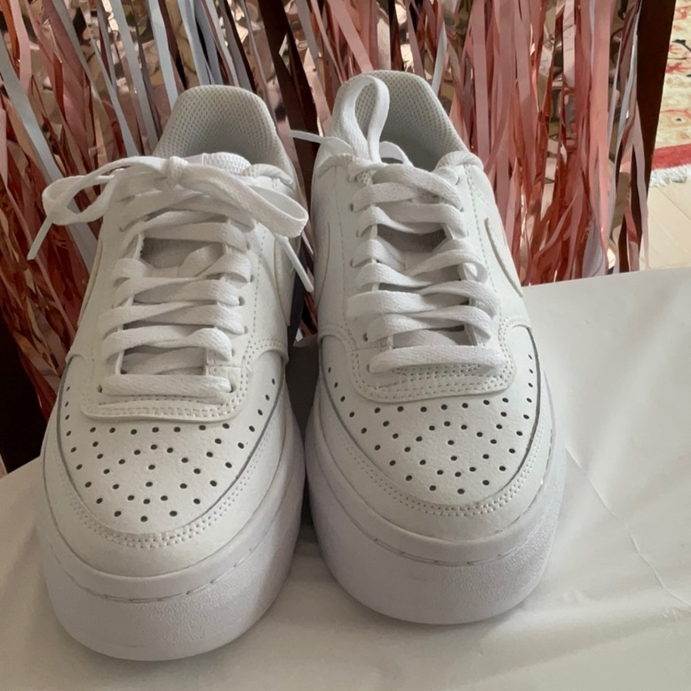 Size 6 women’s Nike Court Vision Alta in white!